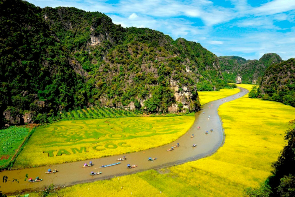 The Tam Coc boat ride offers a peaceful journey along the Ngo Dong River 